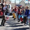 Women making a drum line