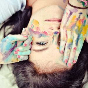 girl with paint on hands