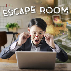 Man in a suit and holding on to his glasses reacting to his laptop displaying an escape room game