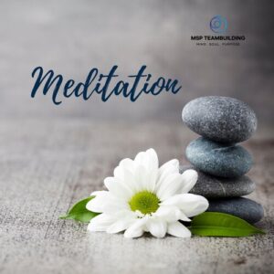 Zen 4 stones piled up on top of each other with a white flower | Stress relief and wellness meditation