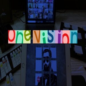 Game display of text saying "one vision" in an abstract deisgn with a background of art props