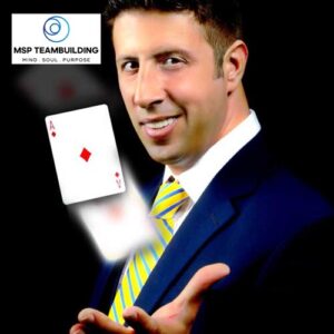 Man reaching out his hand showing card tricks